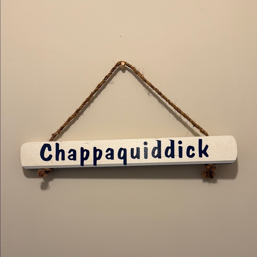 White and Blue Wall Sign